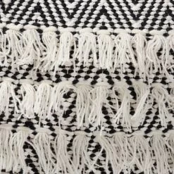 Alian Handwoven Wool Tassel Moroccan Inspired Pouf Ottoman Black/Ivory - Baxton Studio -Fashion Home Decor Store GUEST 6ff721f9 ed5e 4223 a5d9 46d9d57a769d